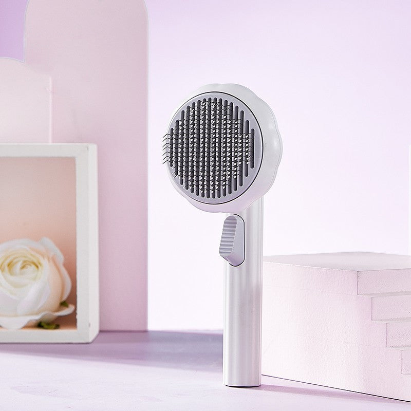 Nouvelle brosse pour chat à poils, vente chaude, peigne en acier inoxydable à main, auto-nettoyant, boucleur pour l'élimination des poils.