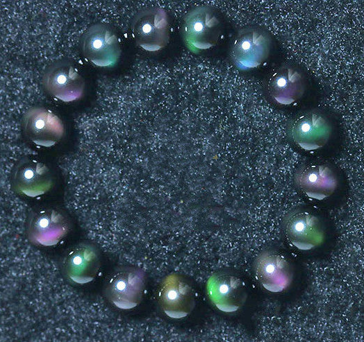 Bracelet en obsidienne à œil violet et vert arc-en-ciel.