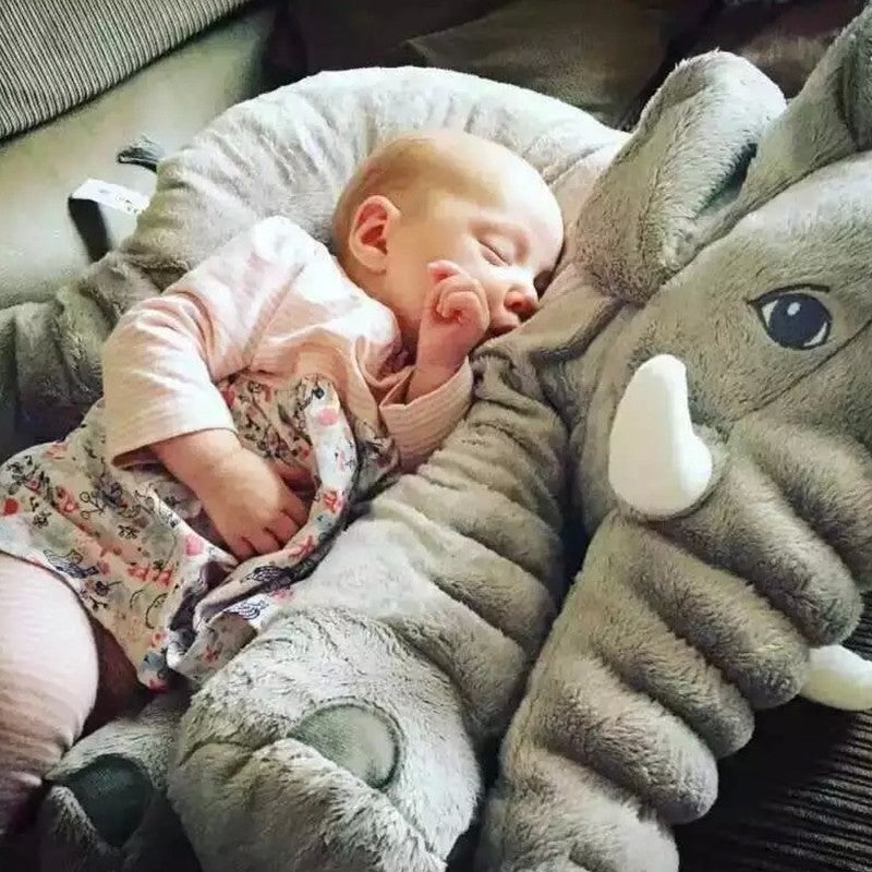 Coussin en peluche éléphant pour le confort et le sommeil des bébés.