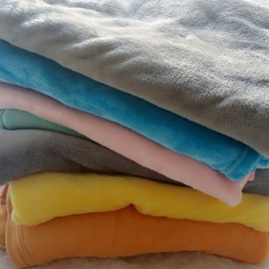 Coussin en peluche éléphant pour le confort et le sommeil des bébés.