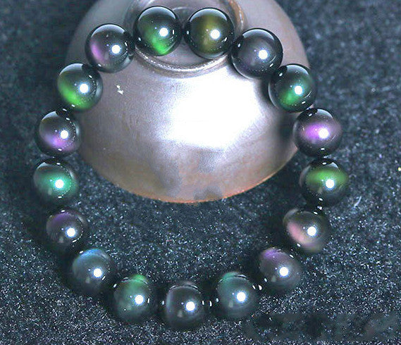 Bracelet en obsidienne à œil violet et vert arc-en-ciel.