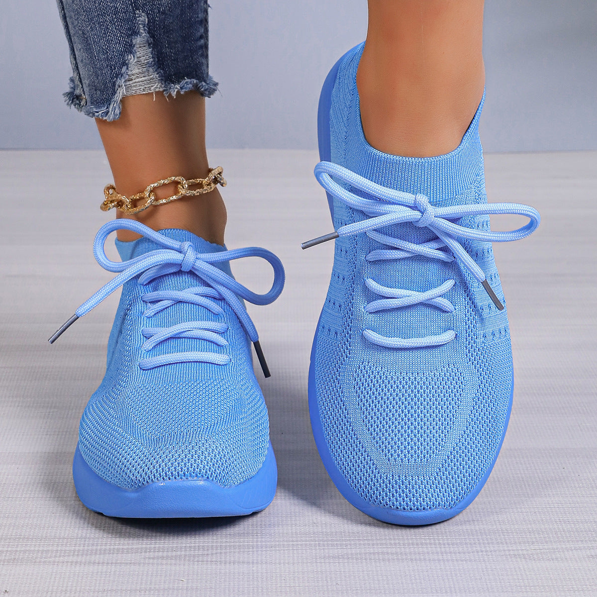 Chaussures de sport pour femmes légères, respirantes et décontractées à semelle souple.