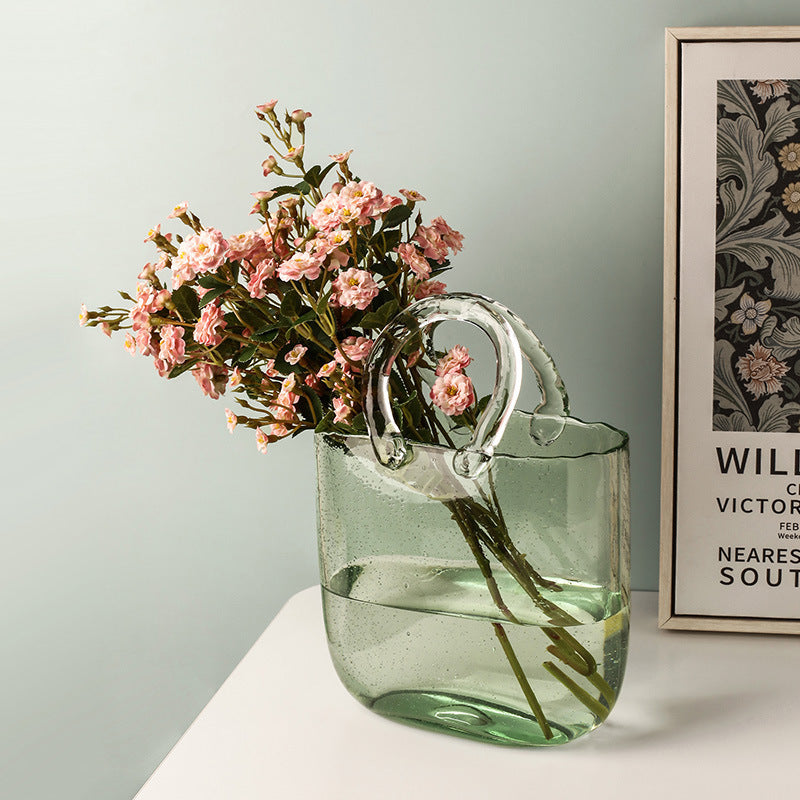 Sac transparent ornements simples arrangement floral hydroponique pour salon.