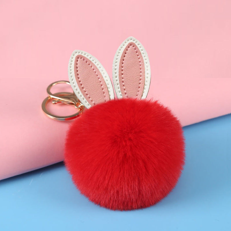 Petit pendentif boule pelucheuse pour sac d'école pour fille