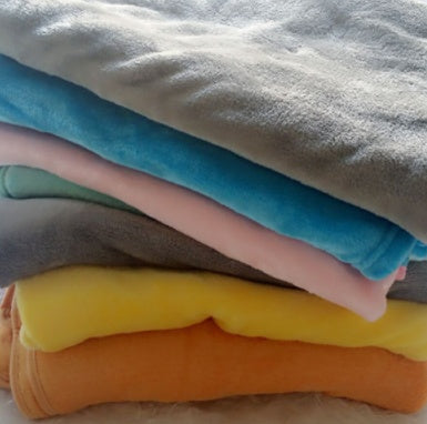Coussin en peluche éléphant pour le confort et le sommeil des bébés.