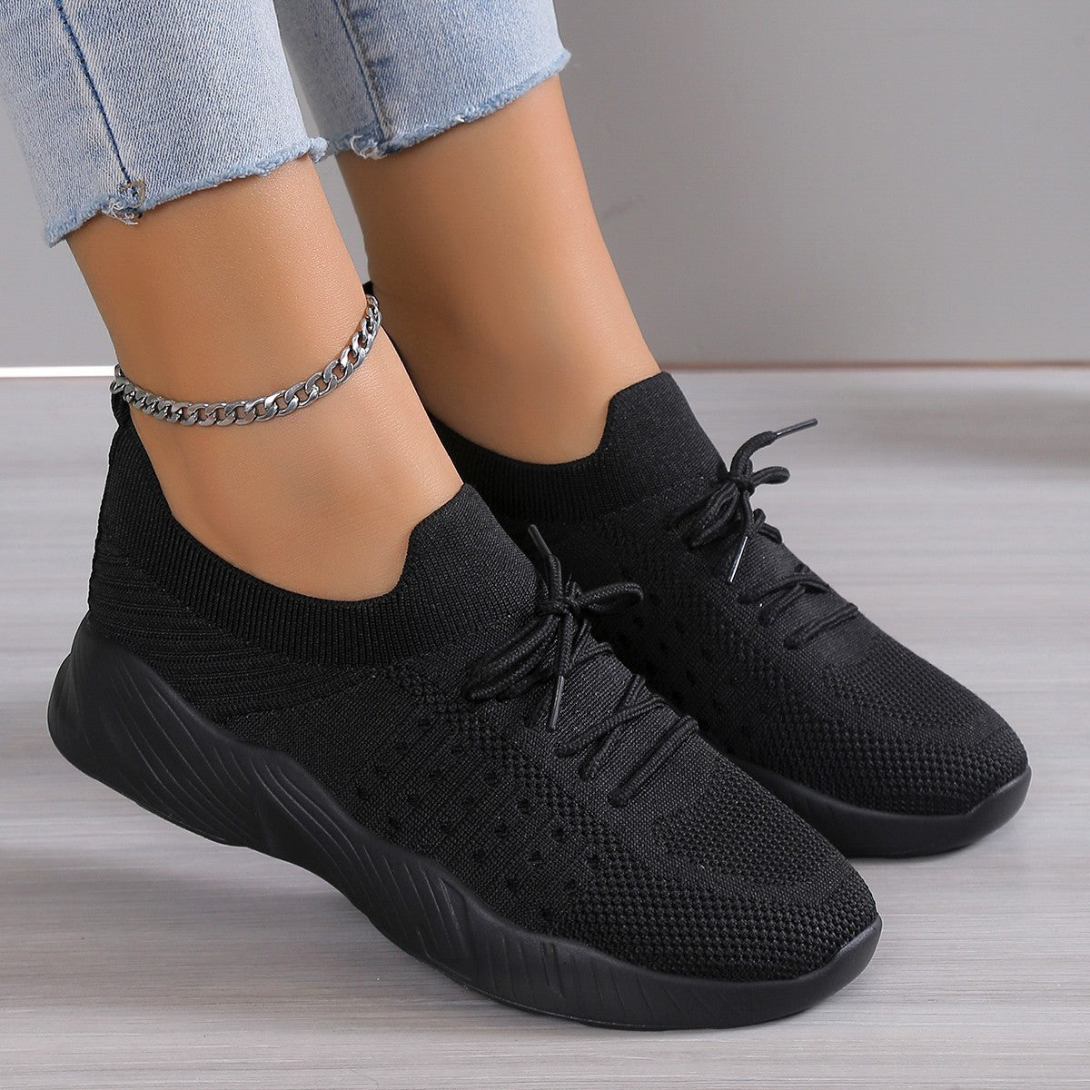 Chaussures de sport pour femmes légères, respirantes et décontractées à semelle souple.