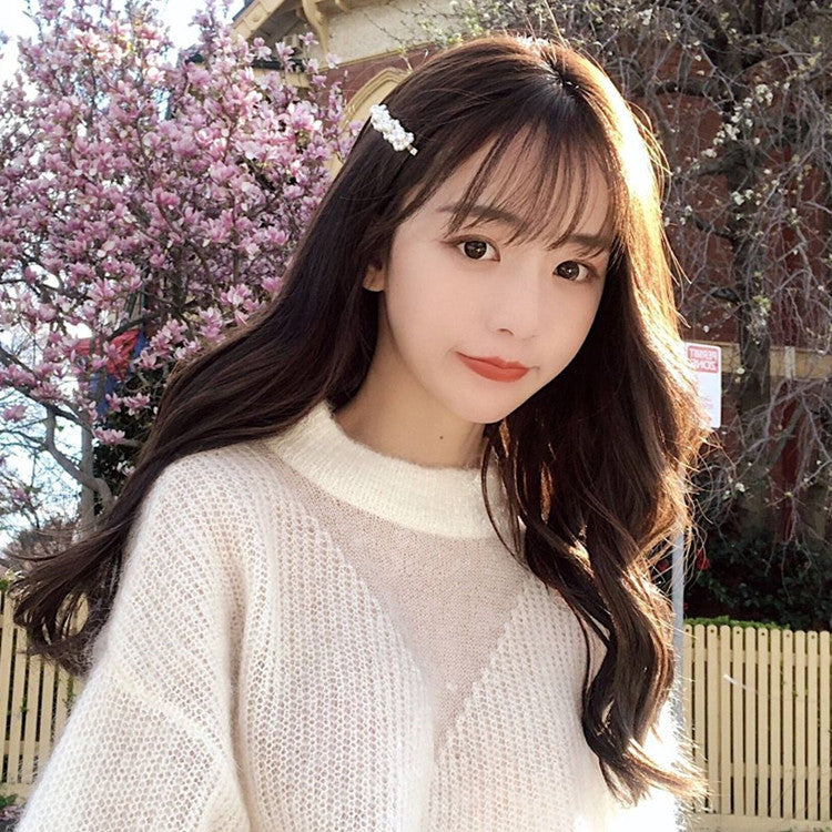 Cheveux longs bouclés rose clair