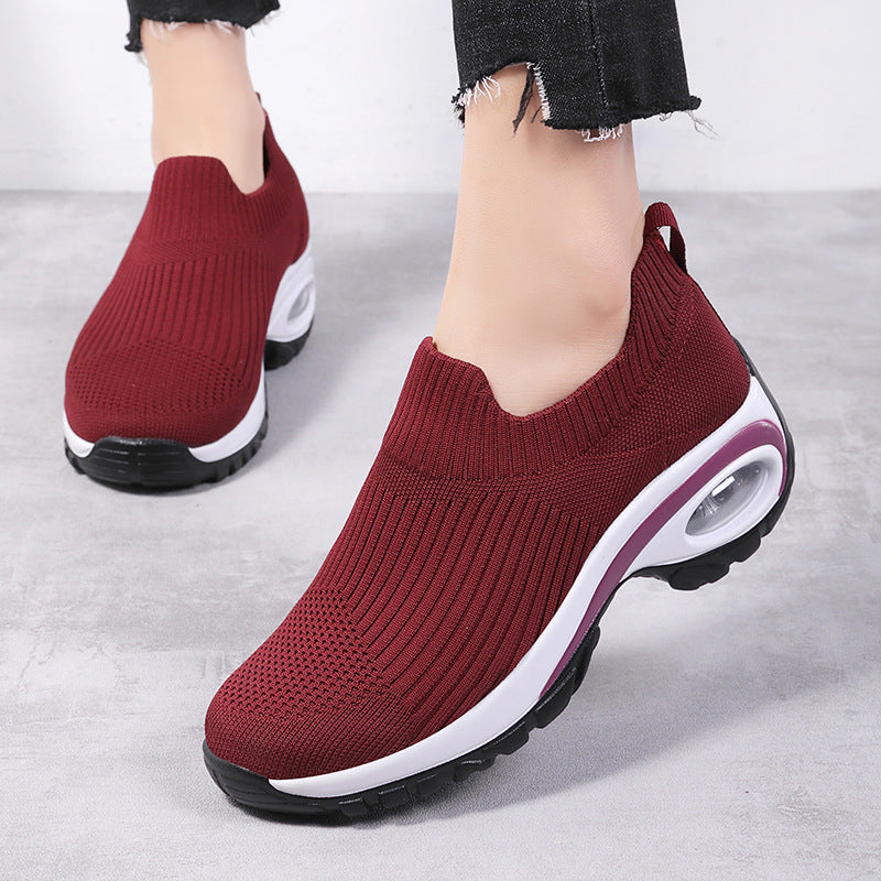 Baskets pour femmes avec coussin d'air en maille respirante pour la course et les sports.