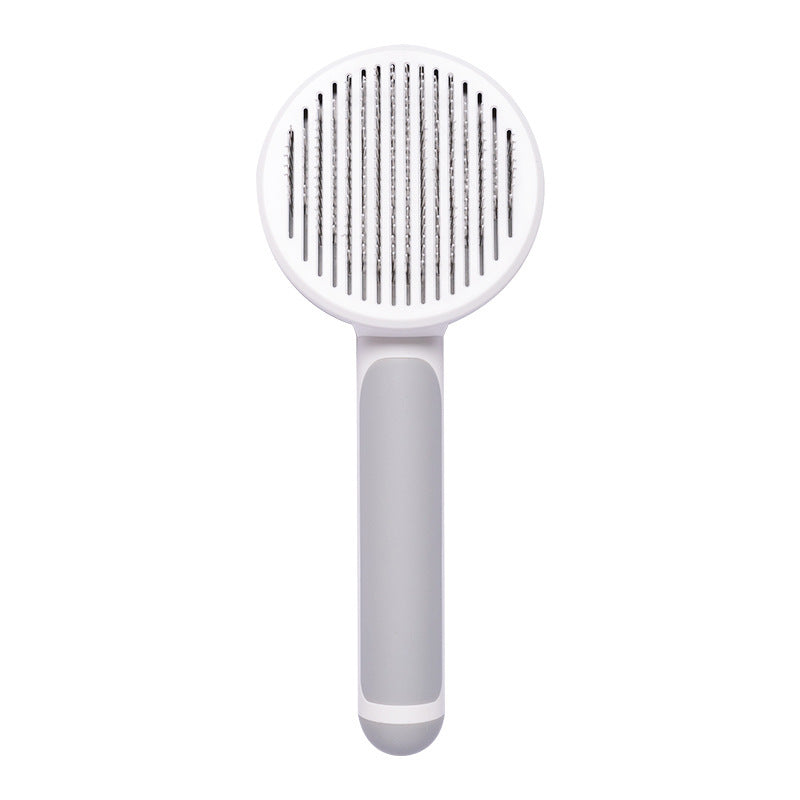 Nouvelle brosse pour chat à poils, vente chaude, peigne en acier inoxydable à main, auto-nettoyant, boucleur pour l'élimination des poils.
