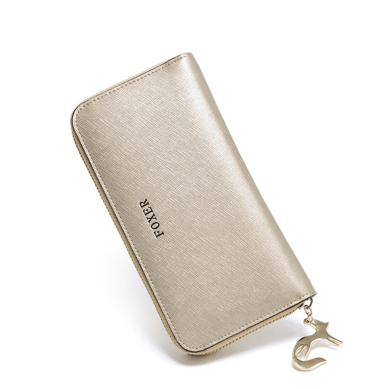 Porte-monnaie avec plusieurs emplacements pour cartes, long et léger, sac à main de luxe populaire pour femmes.