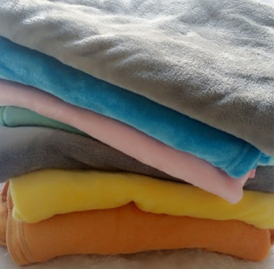 Coussin en peluche éléphant pour le confort et le sommeil des bébés.