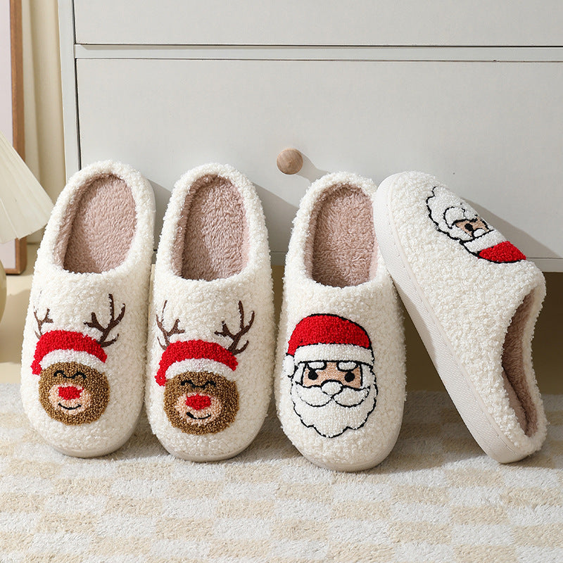 Chaussons de Noël en coton avec un mignon Père Noël en cartoon pour femmes et hommes, chaussures d'hiver chaudes et duveteuses pour couples.