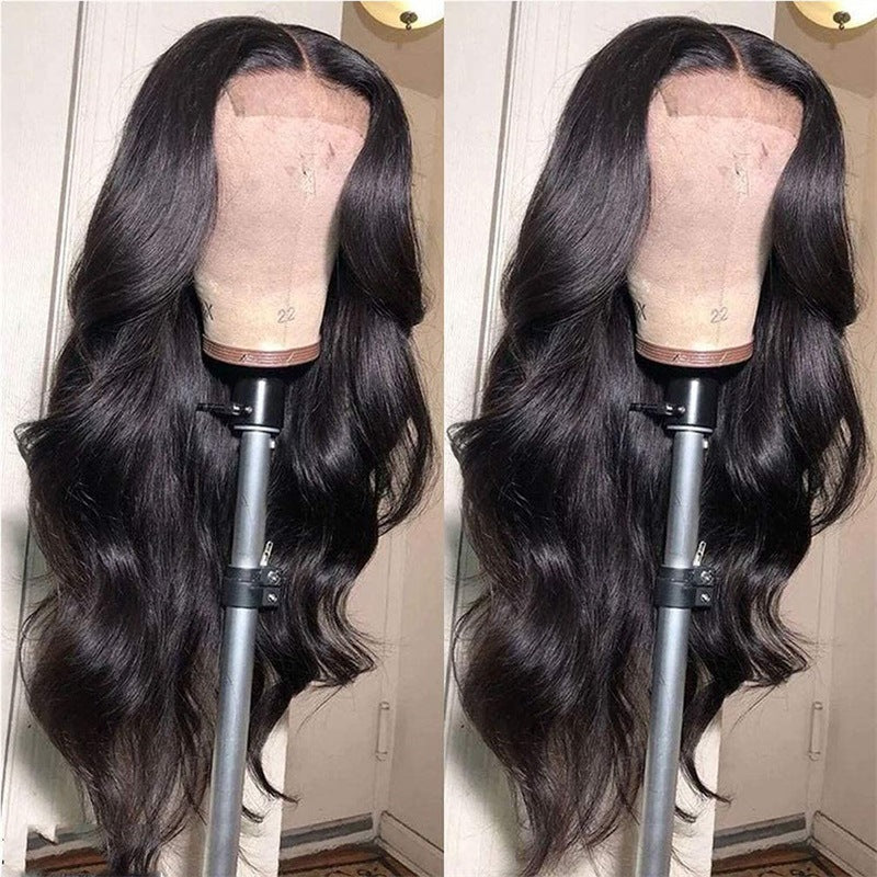 Cheveux longs et ondulés à la mode pour femmes au milieu du corps