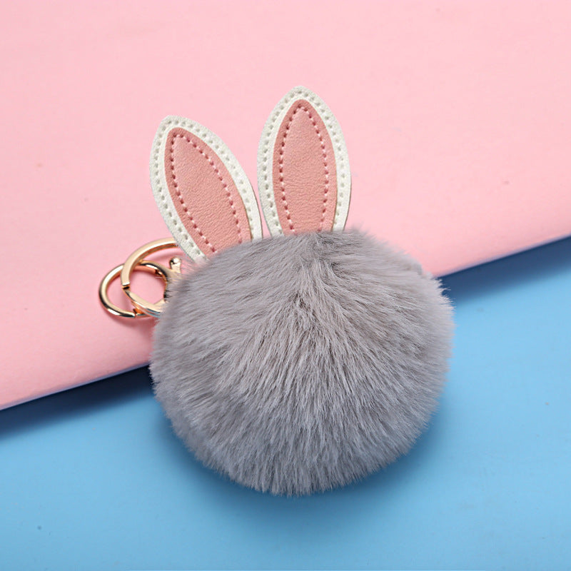 Petit pendentif boule pelucheuse pour sac d'école pour fille