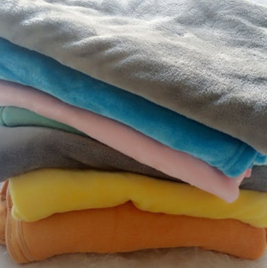 Coussin en peluche éléphant pour le confort et le sommeil des bébés.