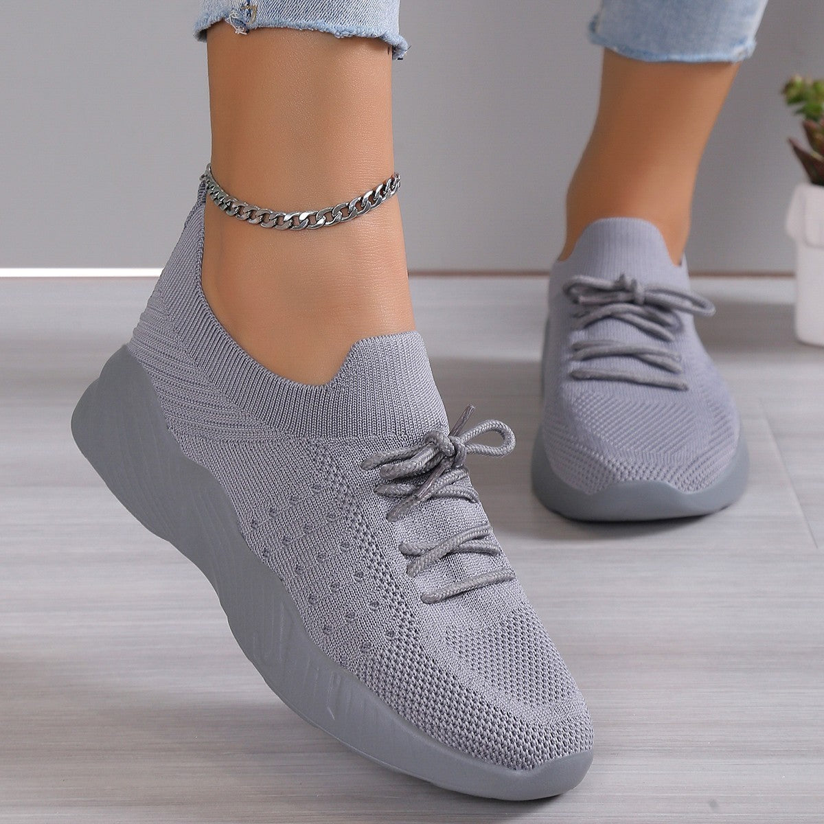 Chaussures de sport pour femmes légères, respirantes et décontractées à semelle souple.