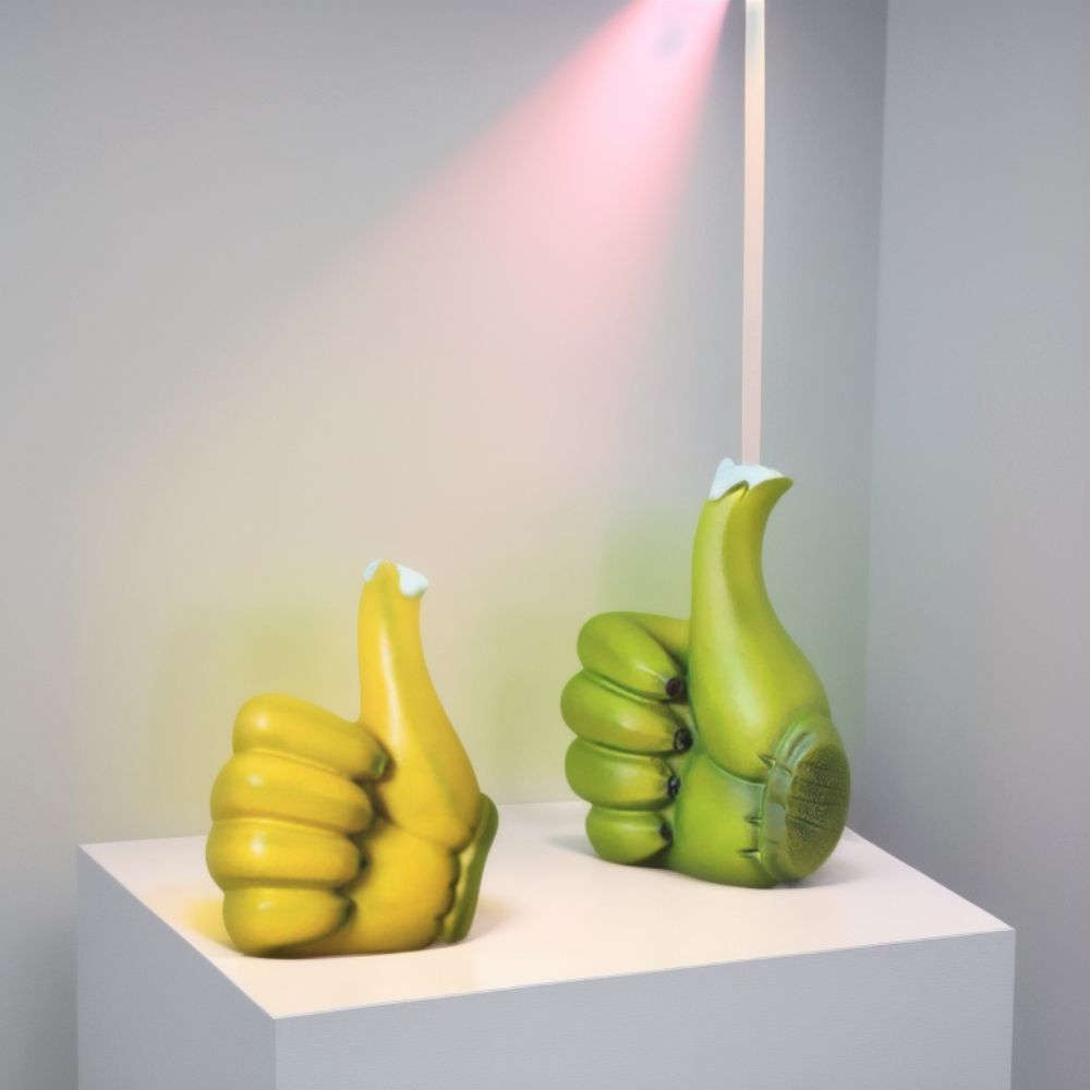 Ornement artisanal créatif en résine en forme de main avec le pouce levé en forme de banane