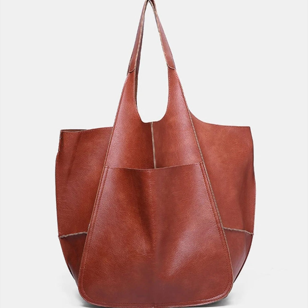 Sac à main en cuir souple, grand format, grande capacité, à porter à l'épaule ou à la main.