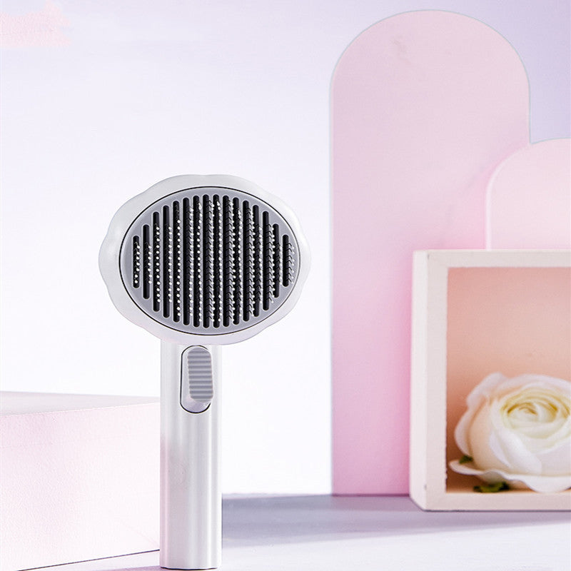 Nouvelle brosse pour chat à poils, vente chaude, peigne en acier inoxydable à main, auto-nettoyant, boucleur pour l'élimination des poils.