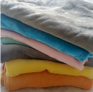 Coussin en peluche éléphant pour le confort et le sommeil des bébés.