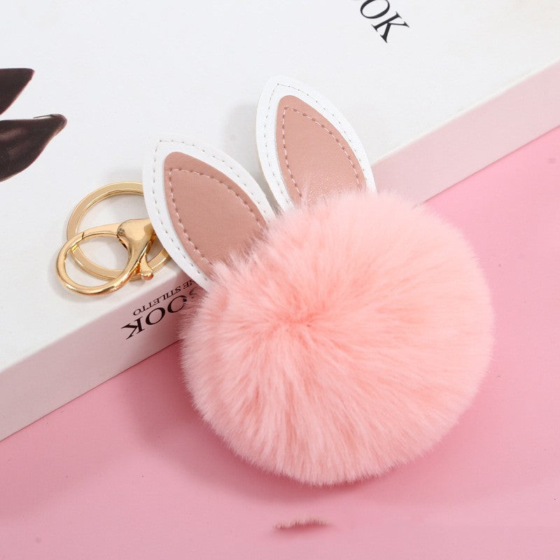 Petit pendentif boule pelucheuse pour sac d'école pour fille
