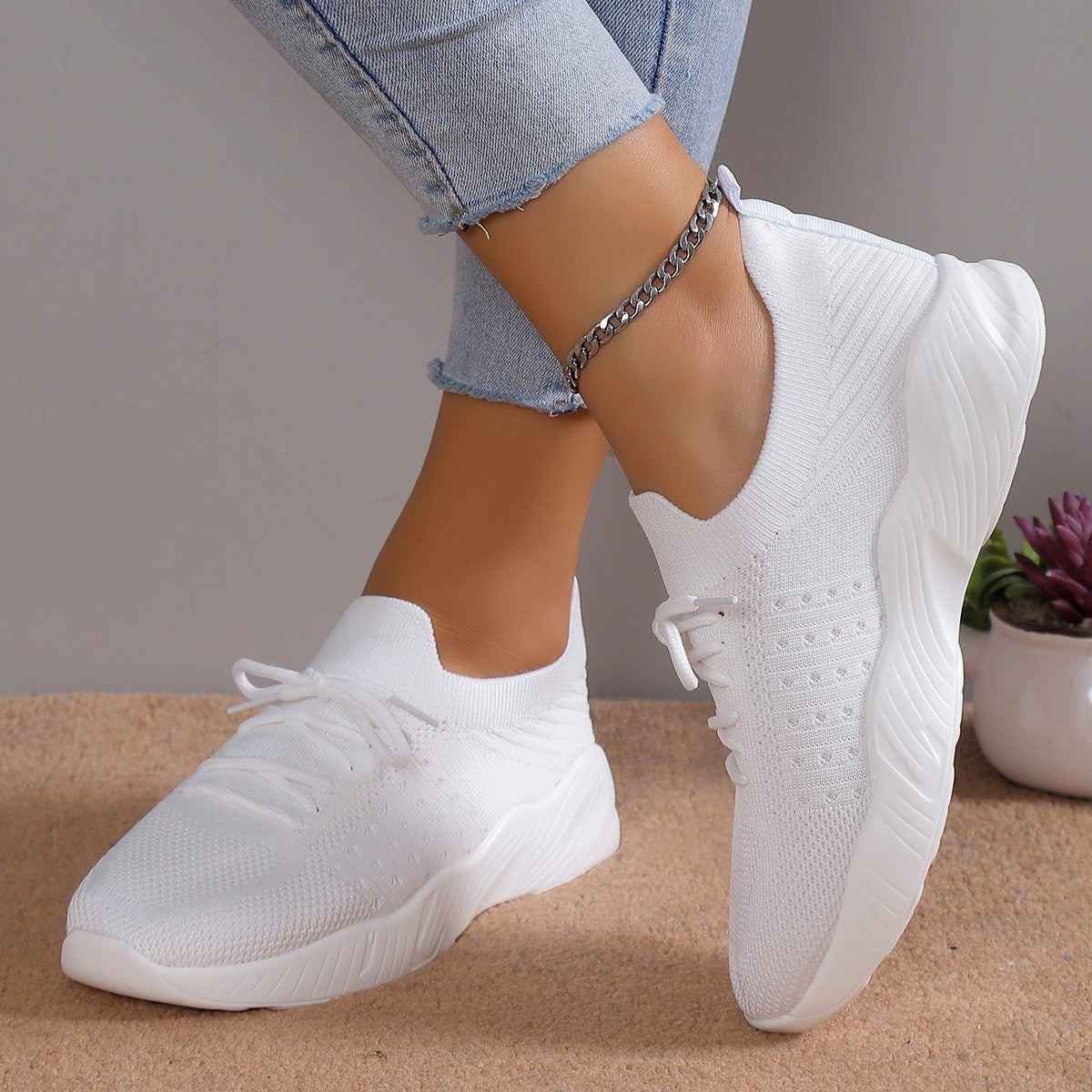 Chaussures de sport pour femmes légères, respirantes et décontractées à semelle souple.