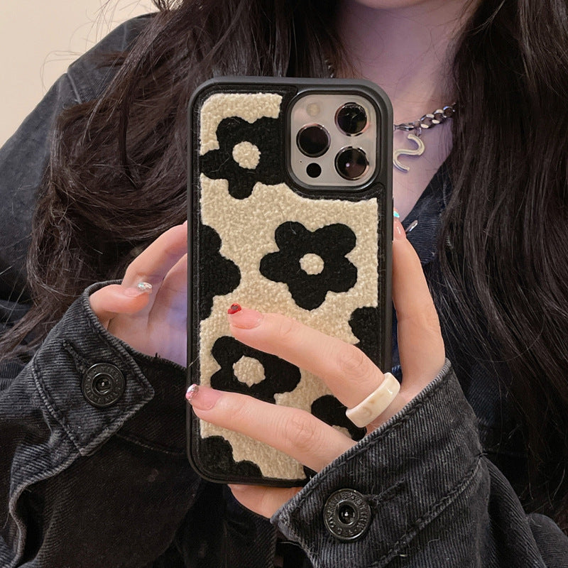 Les fleurs en peluche sont adaptées aux étuis de téléphone mobile pour femmes en automne et en hiver.