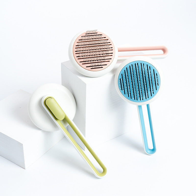 Outil de toilettage pour chien et chat, brosse à poils pour animaux de compagnie, peigne de massage automatique, brosse ronde pour animaux de compagnie.