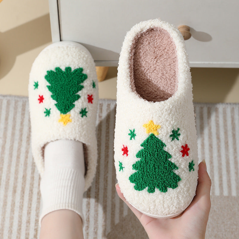 Chaussons de Noël en coton avec un mignon Père Noël en cartoon pour femmes et hommes, chaussures d'hiver chaudes et duveteuses pour couples.