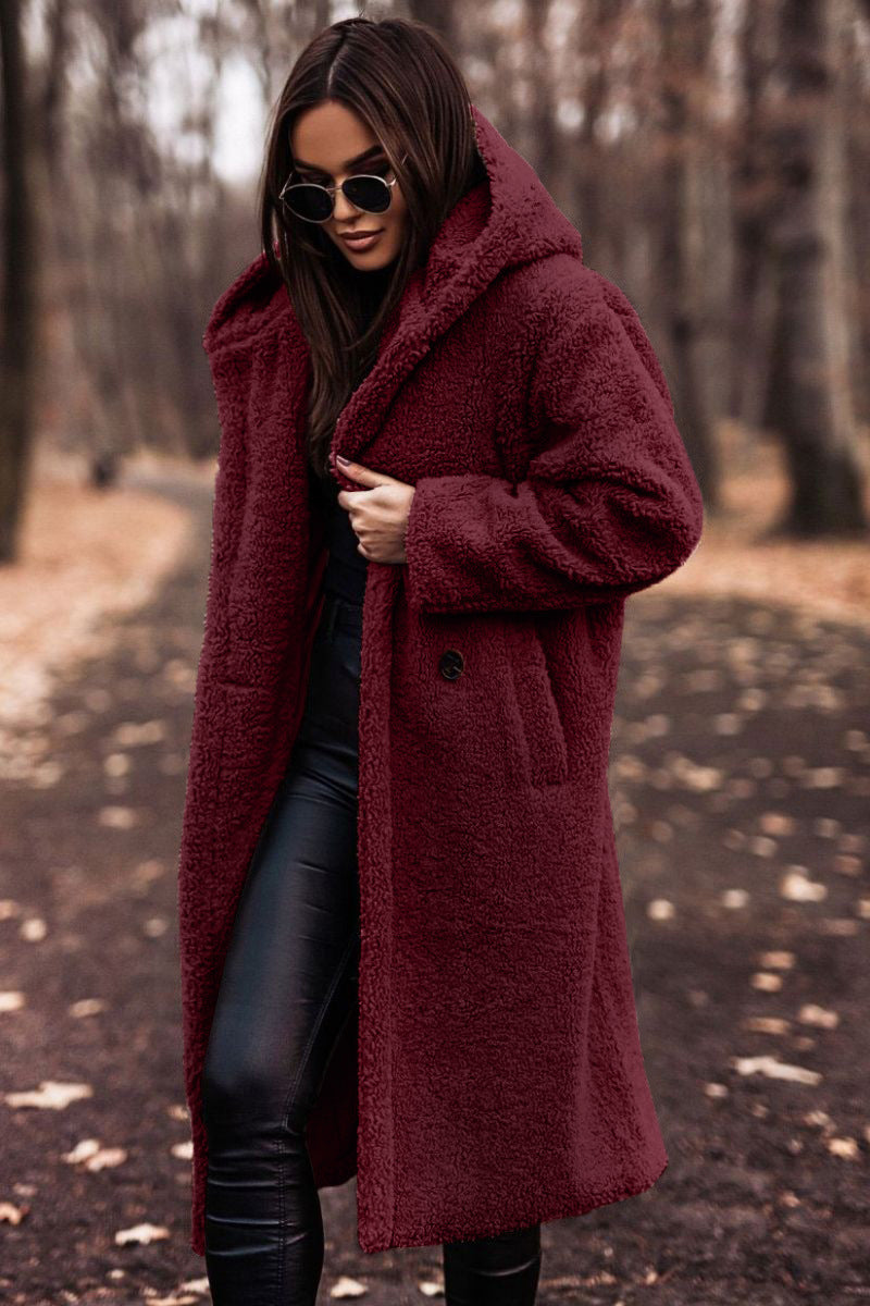 Manteau en laine pour femmes, long, propre, de couleur, à manches longues.