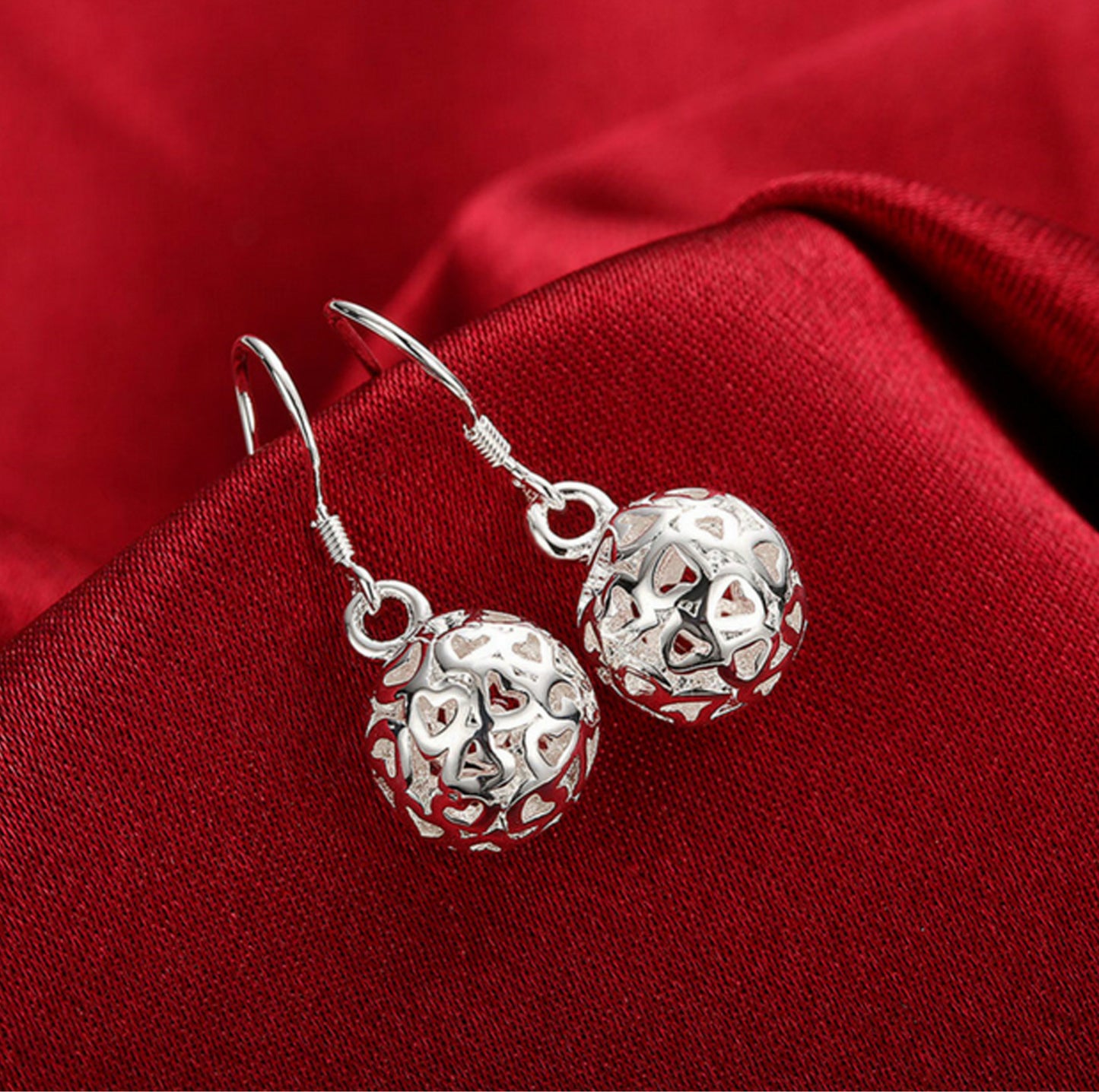 Boucles d'oreilles en forme de cœur creux