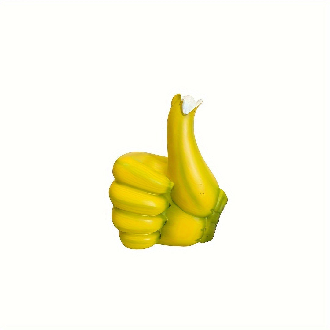 Ornement artisanal créatif en résine en forme de main avec le pouce levé en forme de banane