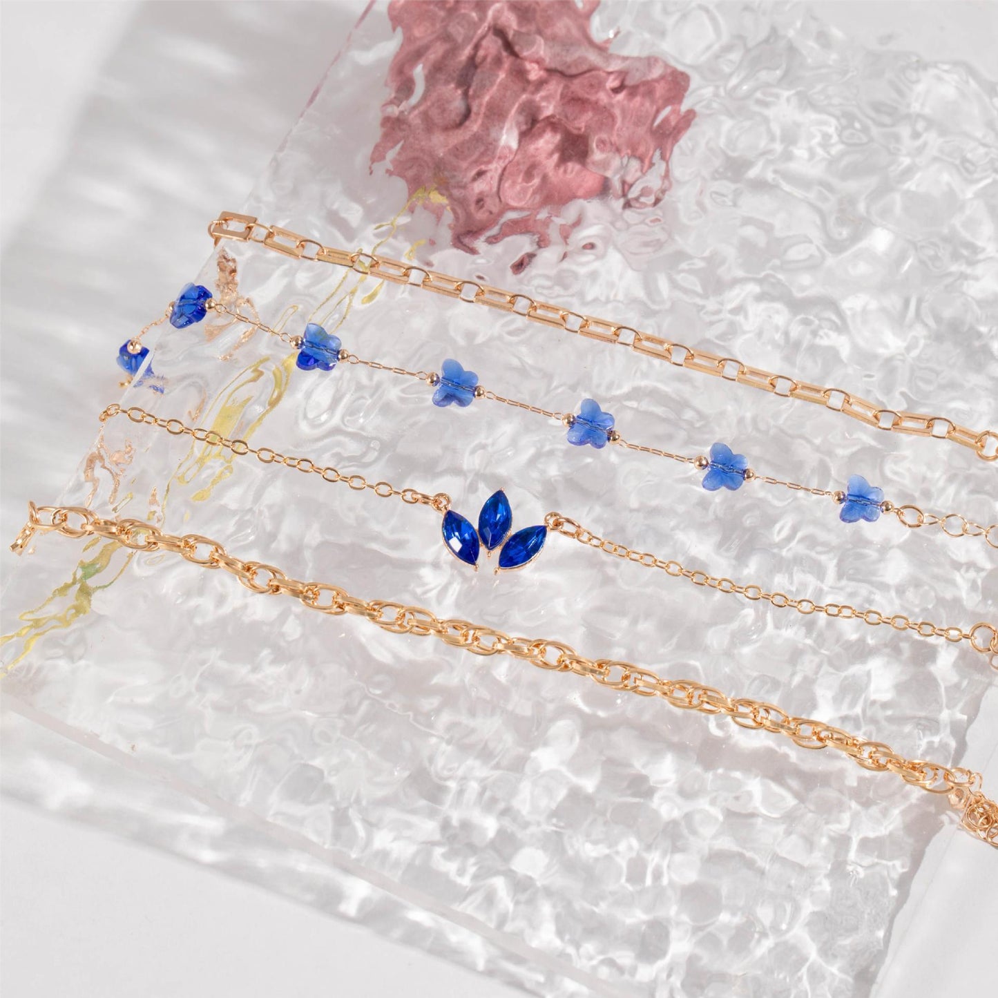 Lot de 4 bracelets papillons et fleurs bleues avec strass pour la Saint-Valentin