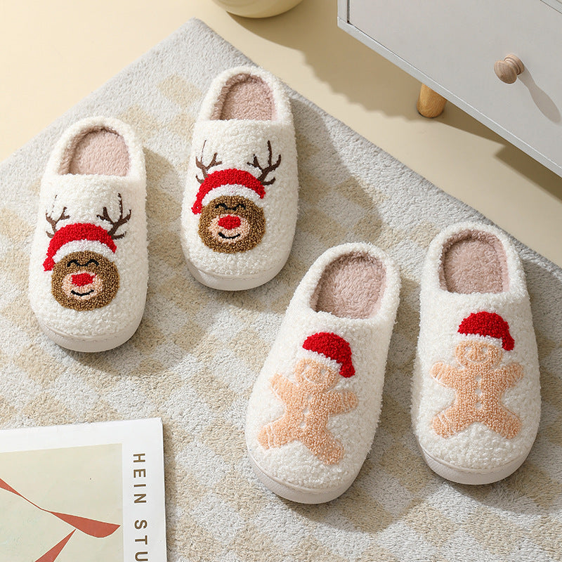 Chaussons de Noël en coton avec un mignon Père Noël en cartoon pour femmes et hommes, chaussures d'hiver chaudes et duveteuses pour couples.