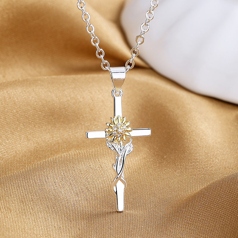 Collier pendentif croix en or et argent bicolore fleur de tournesol pour femme