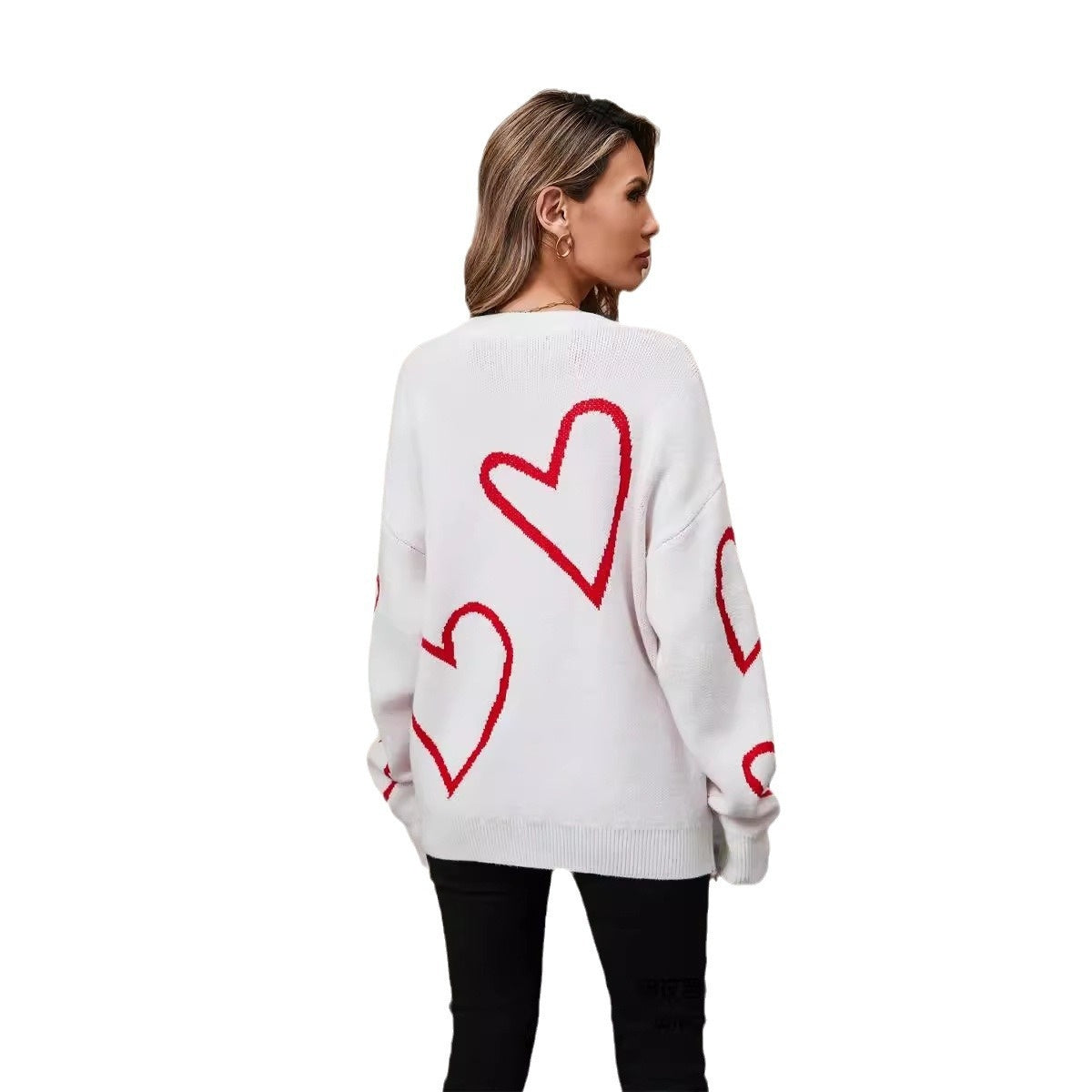 Pull-over féminin avec cœurs, pull de la Saint-Valentin, grand cœur pêche, pull en contraste de couleurs.