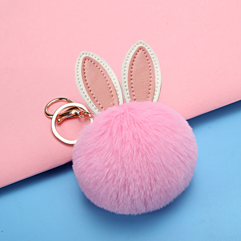 Petit pendentif boule pelucheuse pour sac d'école pour fille