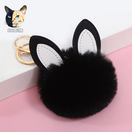 Petit pendentif boule pelucheuse pour sac d'école pour fille