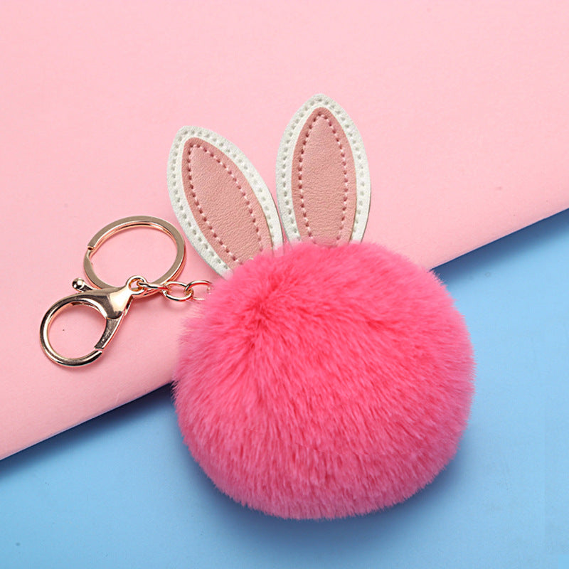 Petit pendentif boule pelucheuse pour sac d'école pour fille