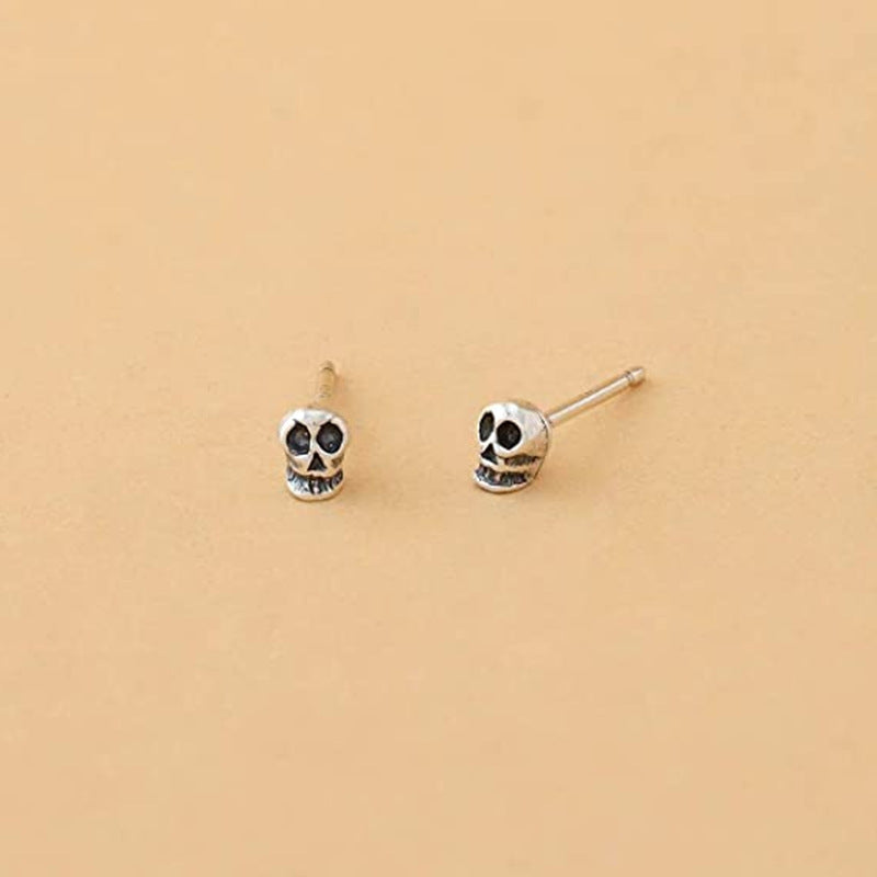 Boucles d'oreilles en forme de tête de fantôme gothique rétro en skull personnalisées populaires européennes et américaines.