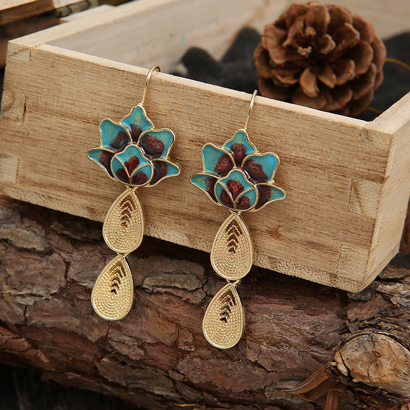 Boucles d'oreilles vintage en soie bleu brûlé avec goutte d'eau de lotus élégant pour femmes.