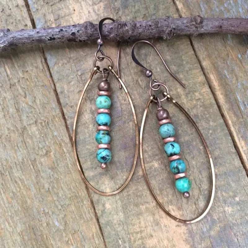 Boucles d'oreilles vintage bohémiennes en perles turquoise.