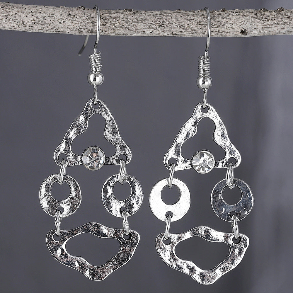 Boucles d'oreilles artistiques rétro géométriques à couture irrégulière et ajourées.