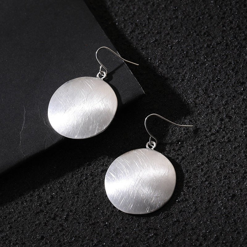 Boucles d'oreilles géométriques en alliage rond brossé de mode pour femmes, simple et de niche. - KaoKao