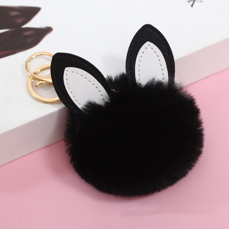 Petit pendentif boule pelucheuse pour sac d'école pour fille