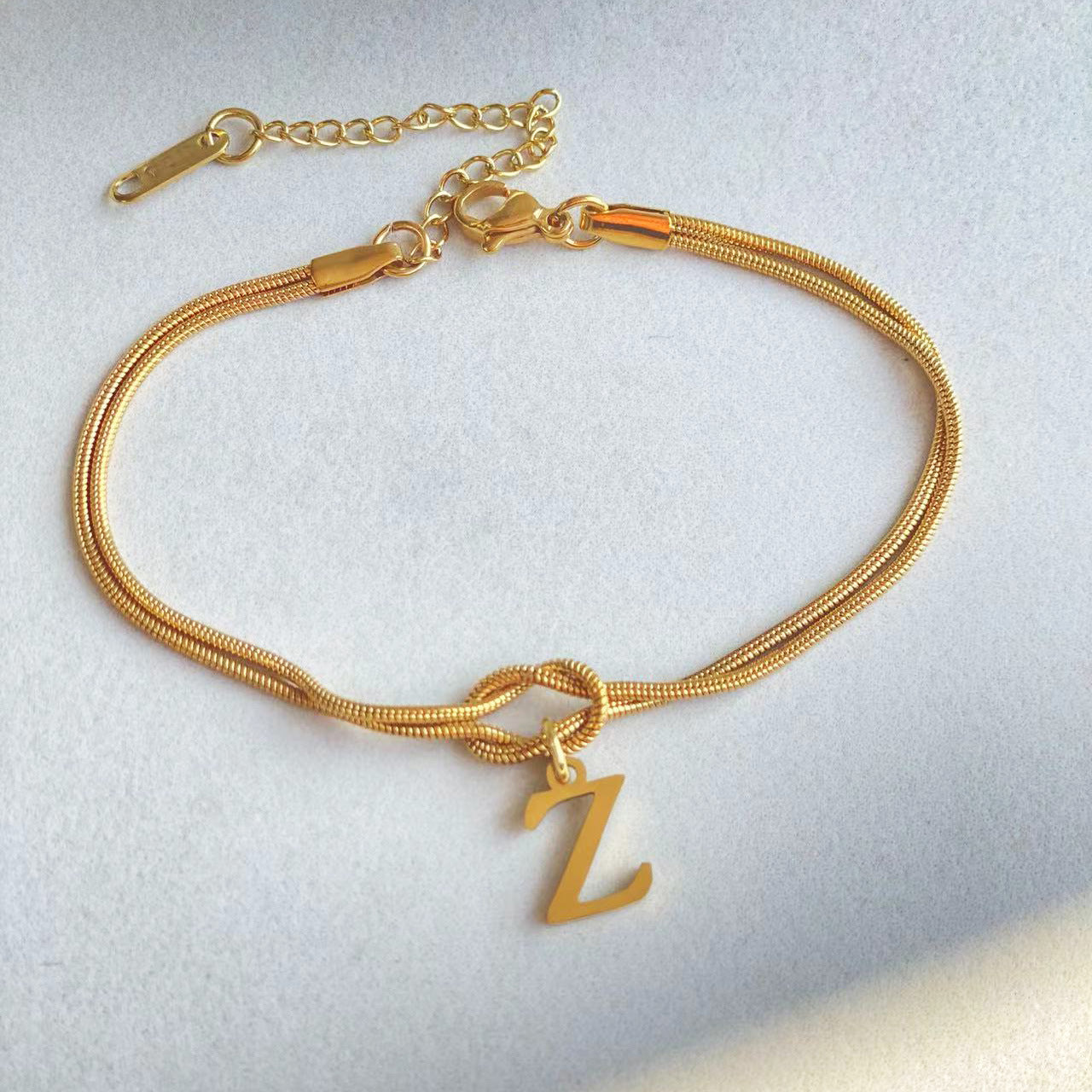 Nouveau bracelet en forme de nœud d'amour A-Z pour femmes, couple, couleur or, bracelet délicat en chaîne serpent, bijou en acier inoxydable, cadeau pour la Saint-Valentin.