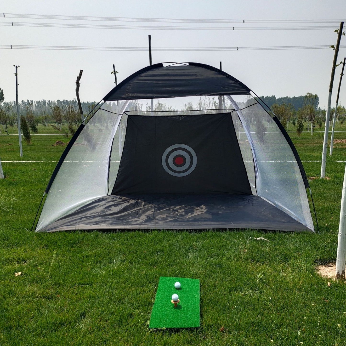 Tente de pratique de golf, cage de frappe de golf, tente de pratique sur gazon, équipement d'entraînement de golf en maille, extérieur.