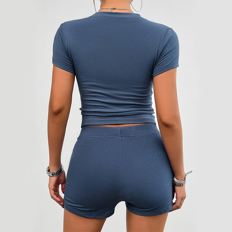 Ensemble de sport slim de couleur unie pour femme, 2 pièces, t-shirt à manches courtes et col rond, short élastique, vêtements à la mode